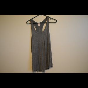 Loose fitting flowy racerback tank.